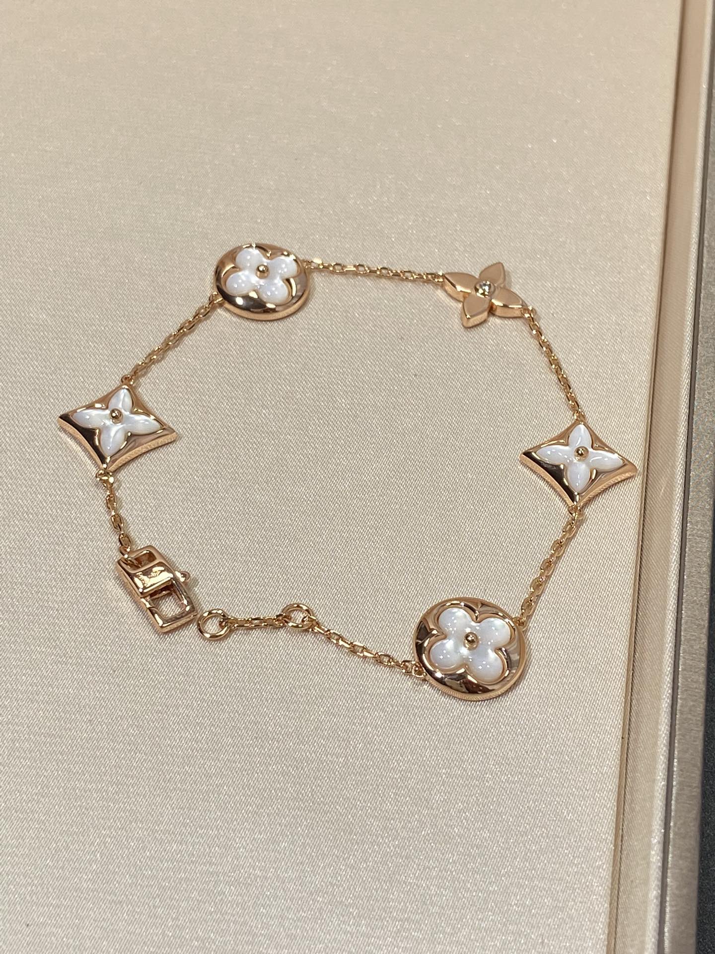 [Royal Jewelry]STAR AND SUN 5 MOTIF MOP PINK GOLD BRACELET