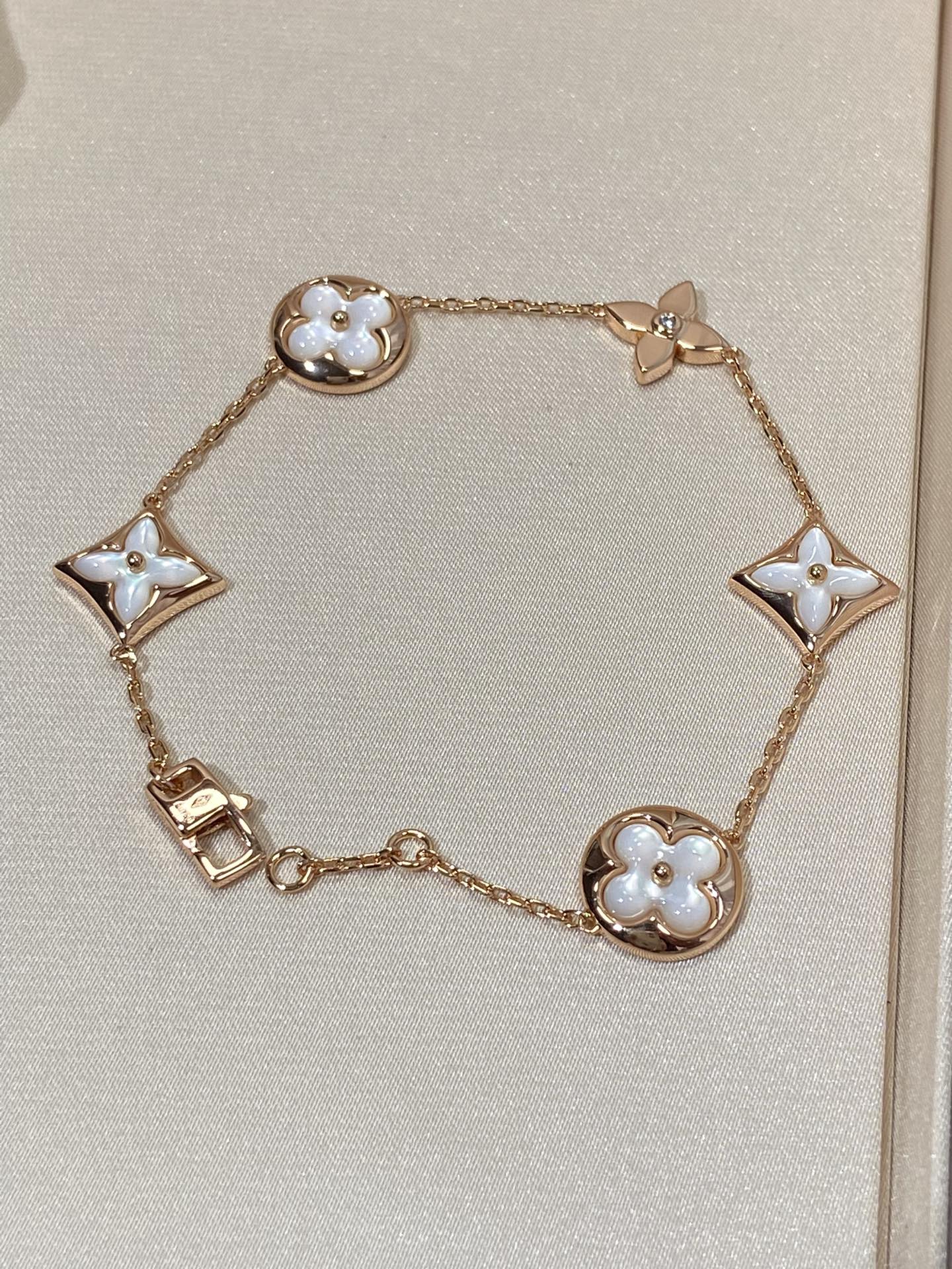 [Royal Jewelry]STAR AND SUN 5 MOTIF MOP PINK GOLD BRACELET