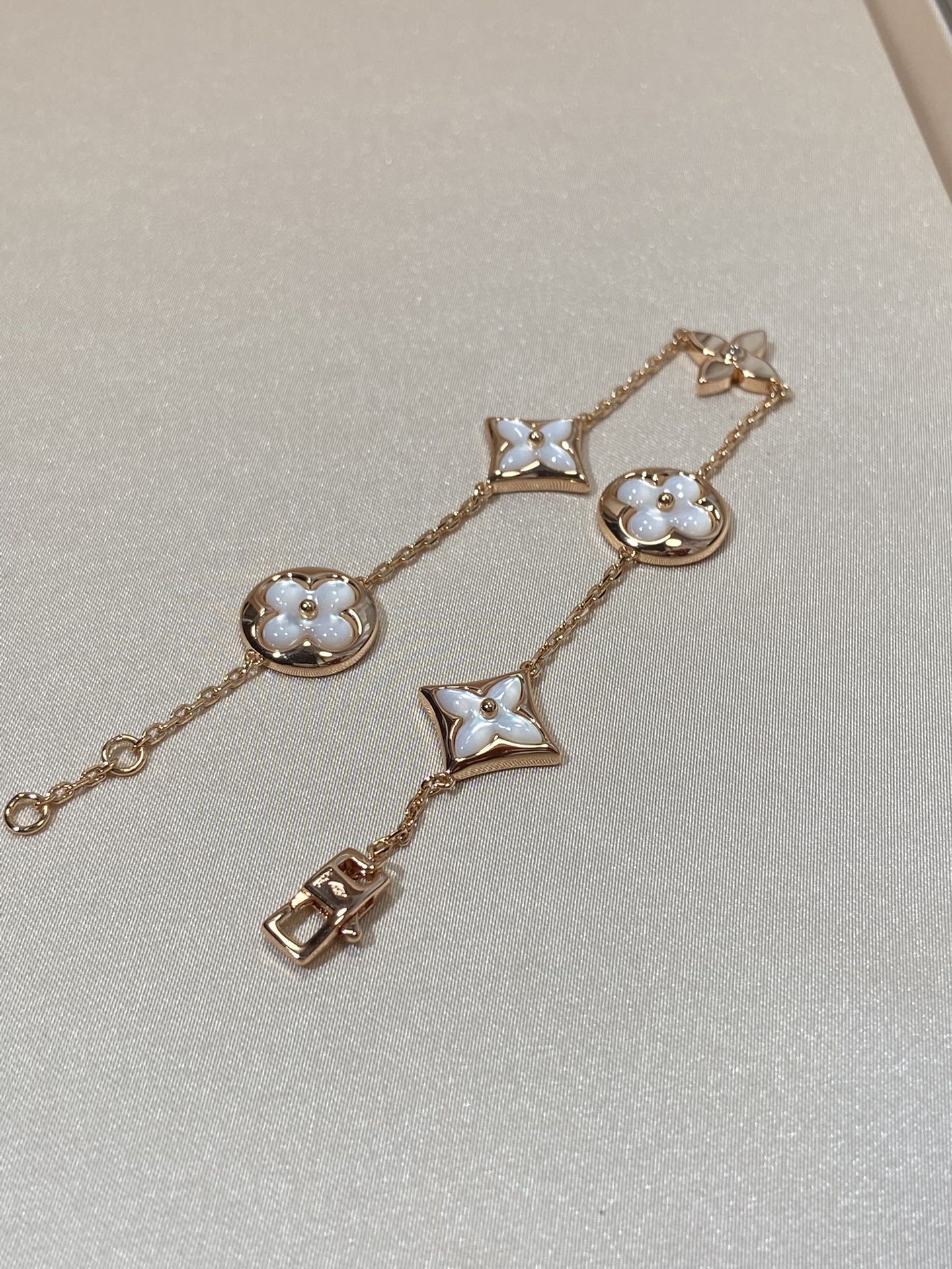 [Royal Jewelry]STAR AND SUN 5 MOTIF MOP PINK GOLD BRACELET