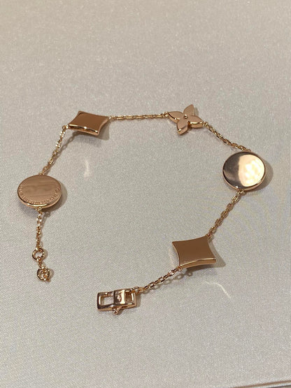 [Royal Jewelry]STAR AND SUN 5 MOTIF MOP PINK GOLD BRACELET