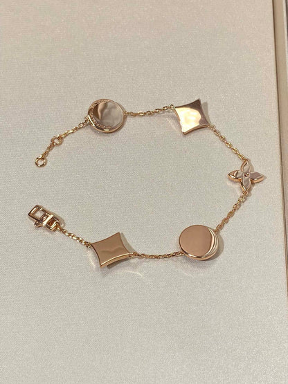 [Royal Jewelry]STAR AND SUN 5 MOTIF MOP PINK GOLD BRACELET