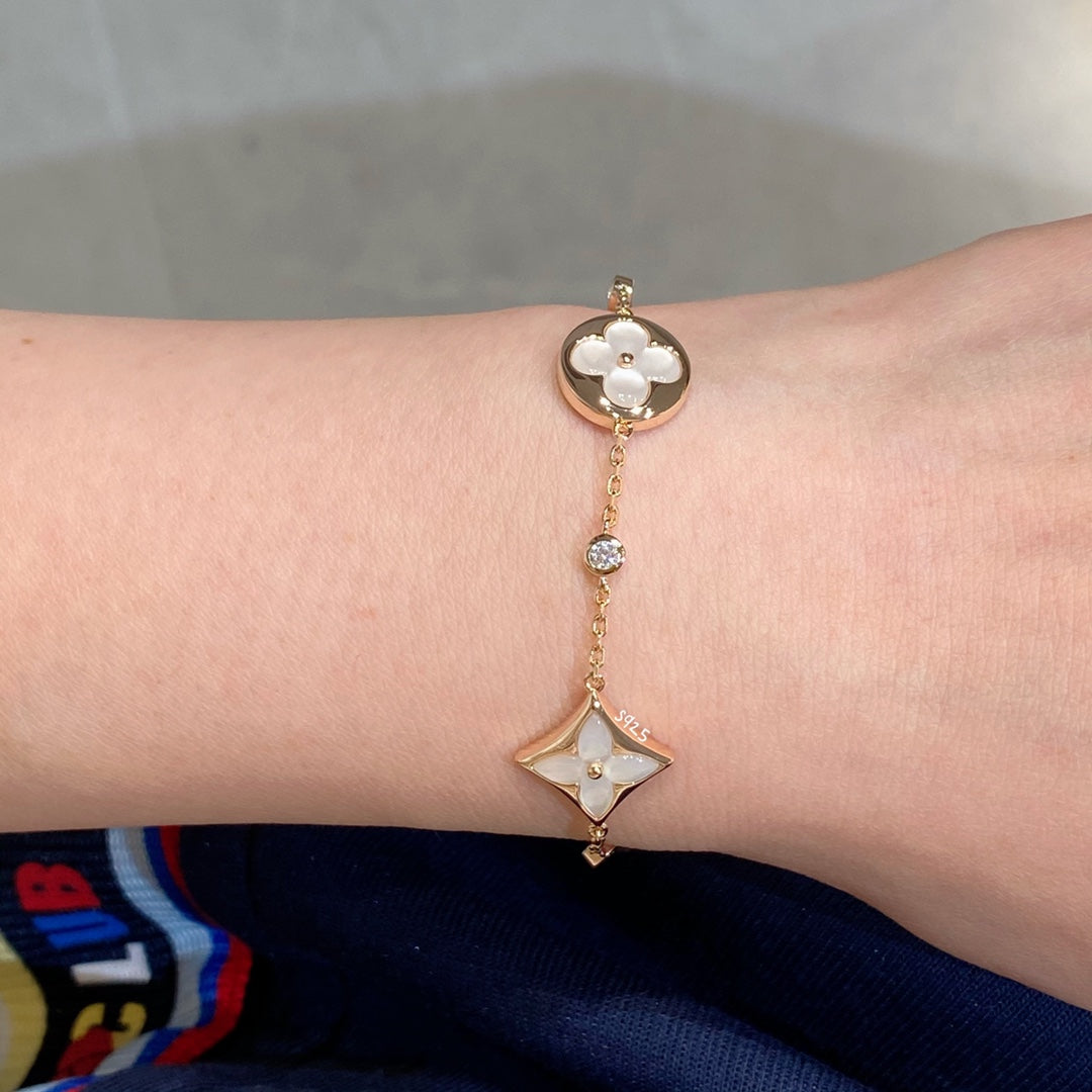 [Royal Jewelry]STAR AND SUN 4 MOTIF WHITE MOP PINK GOLD BRACELET