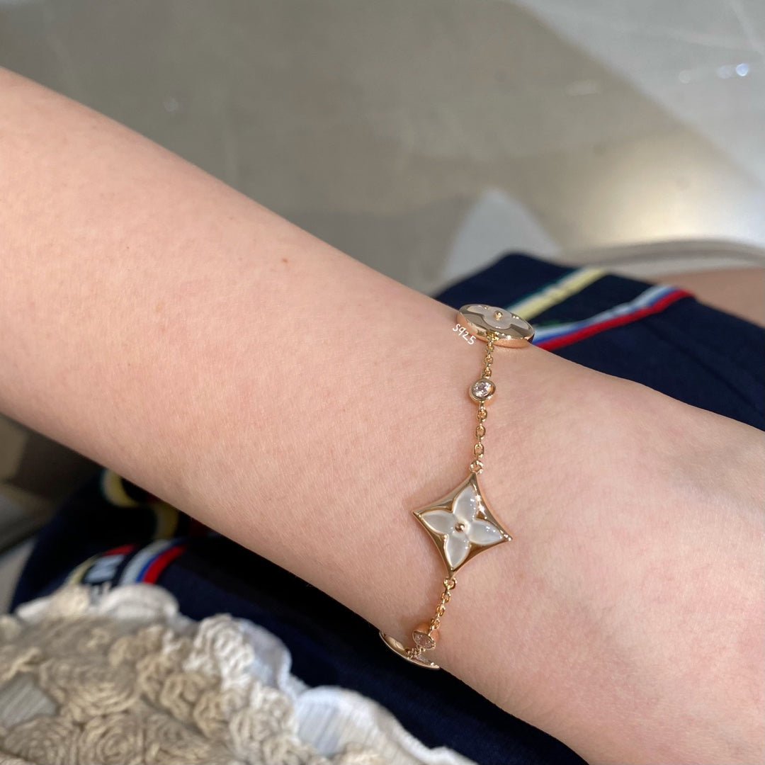 [Royal Jewelry]STAR AND SUN 4 MOTIF WHITE MOP PINK GOLD BRACELET